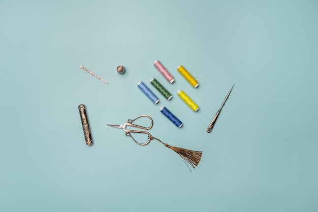 Set of colorful threads and scissors